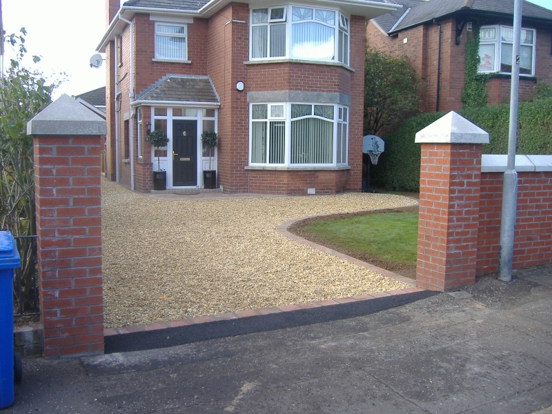 pillars-driveway old red bricked house
